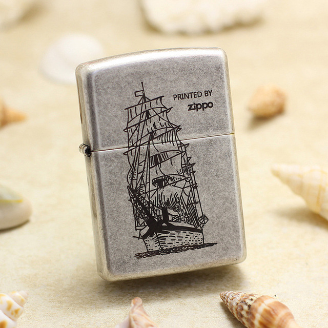zippoLighter Antique Silver121FBCarving a smooth sailing boat